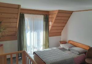 Posteľ alebo postele v izbe v ubytovaní Apartamenty U Samków
