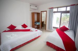 Voodi või voodid majutusasutuse Gran Hostal Tintorera toas