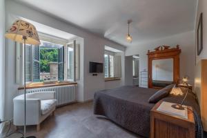 TV a/nebo společenská místnost v ubytování San Leo Albergo Diffuso