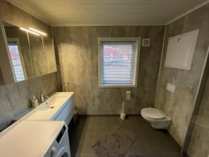 Koupelna v ubytování Lofoten Havfiske