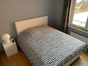 Postel nebo postele na pokoji v ubytování Privé-kamer centrum Oostende met eigen badkamer/wc