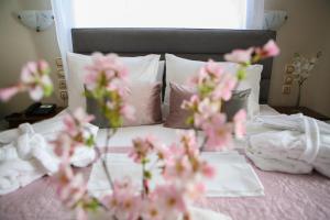Postel nebo postele na pokoji v ubytování Hotel Karagianni