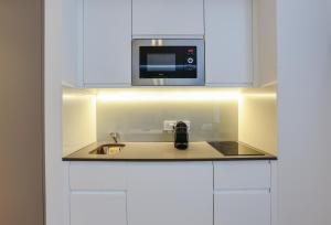 Cuisine ou kitchenette dans l'établissement Inverness Terrace Serviced Apartments by Concept Apartments