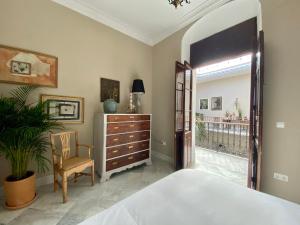 Postel nebo postele na pokoji v ubytování Casa Palacio Ánima