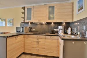 Kuchyň nebo kuchyňský kout v ubytování Berliner Hof Berliner Hof Appartement 313