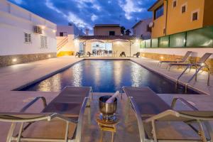 The swimming pool at or close to Villa Dolphin by Slow Villas
