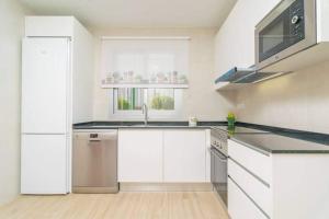 A kitchen or kitchenette at Villa Dolphin by Slow Villas