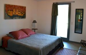 Postel nebo postele na pokoji v ubytování Les Chêneslierres