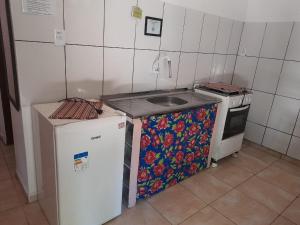 Kuchyň nebo kuchyňský kout v ubytování Sarue Lodge + 30 fotografií