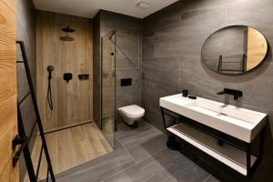 Kúpeľňa v ubytovaní APLEND Hotel Ovruč