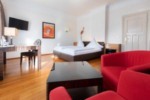 Postelja oz. postelje v sobi nastanitve Hotel Müller