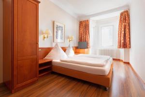Postelja oz. postelje v sobi nastanitve Hotel Müller