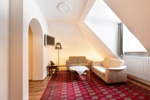 Predel za sedenje v nastanitvi Hotel Müller