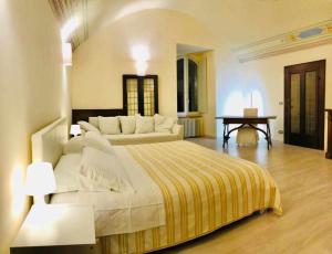 Postel nebo postele na pokoji v ubytování Mavitur Rooms Assisi