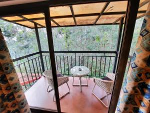 Balkón nebo terasa v ubytování Willow Resorts Wayanad