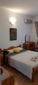 Postel nebo postele na pokoji v ubytování Guest House Evin Rai