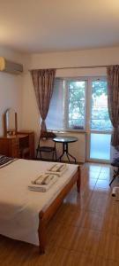 Postel nebo postele na pokoji v ubytování Guest House Evin Rai