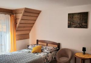 Posteľ alebo postele v izbe v ubytovaní Apartamenty U Samków