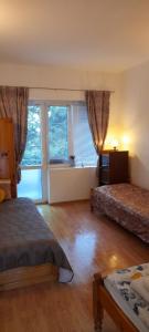 Postel nebo postele na pokoji v ubytování Guest House Evin Rai