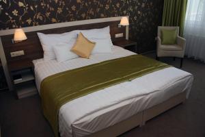 Postel nebo postele na pokoji v ubytování Hotel Európa Gunaras