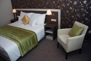 Postel nebo postele na pokoji v ubytování Hotel Európa Gunaras