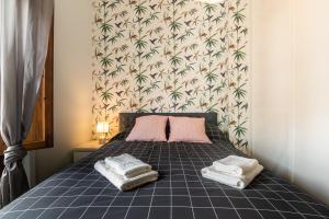 Posteľ alebo postele v izbe v ubytovaní tuGuest Isabel la Catolica II Apartment