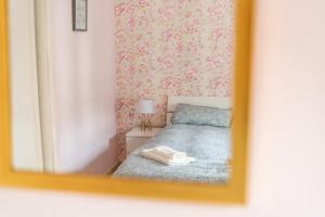 Posteľ alebo postele v izbe v ubytovaní tuGuest Isabel la Catolica II Apartment