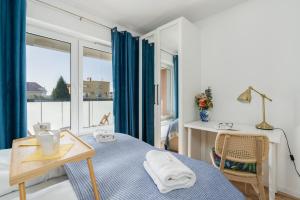 Posteľ alebo postele v izbe v ubytovaní Rezydencja Rejtana with FREE GARAGE Poznań by Noclegi Renters