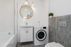 Kúpeľňa v ubytovaní Rezydencja Rejtana with FREE GARAGE Poznań by Noclegi Renters