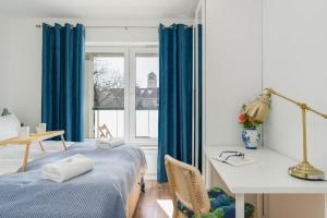 Posteľ alebo postele v izbe v ubytovaní Rezydencja Rejtana with FREE GARAGE Poznań by Noclegi Renters