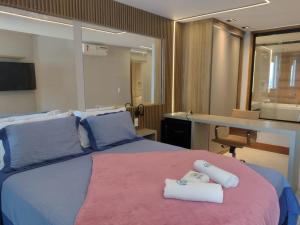 En eller flere senger på et rom på Deck de Búzios + 37 bilder