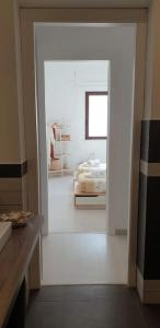 Posteľ alebo postele v izbe v ubytovaní RgB_Apartments