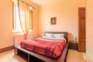 Postel nebo postele na pokoji v ubytování Villa Giusti