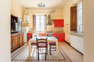 Kuchyň nebo kuchyňský kout v ubytování Villa Giusti