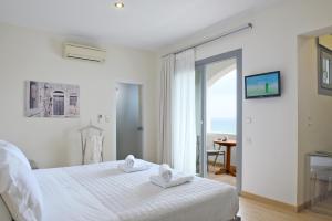 Кровать или кровати в номере Melia Sol Art Studios