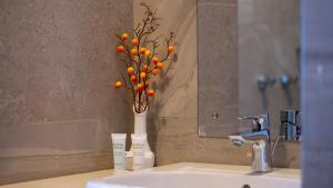 Ein Badezimmer in der Unterkunft The Kyaka Hotel