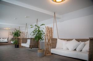 Posezení v ubytování HOTEL DÜNENLÄUFER Carolinensiel