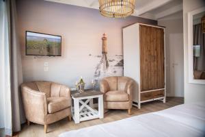 Posezení v ubytování HOTEL DÜNENLÄUFER Carolinensiel