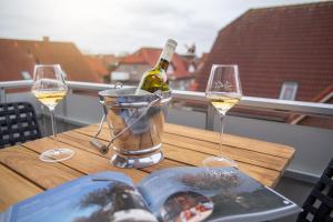 Nápoje v ubytování HOTEL DÜNENLÄUFER Carolinensiel