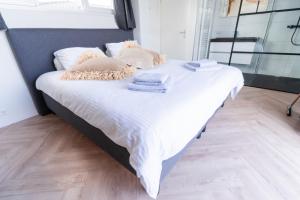 Postel nebo postele na pokoji v ubytování Proosdij B055B