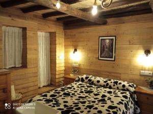 Posteľ alebo postele v izbe v ubytovaní Apartamentos Caleros