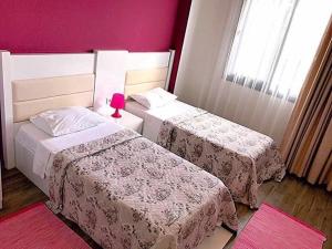 Postel nebo postele na pokoji v ubytování Dalyan Elit Apart Otel