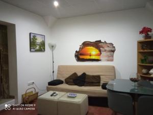 Posedenie v ubytovaní Apartamentos Caleros