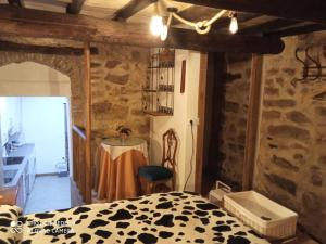 Posteľ alebo postele v izbe v ubytovaní Apartamentos Caleros
