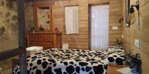 Posteľ alebo postele v izbe v ubytovaní Apartamentos Caleros
