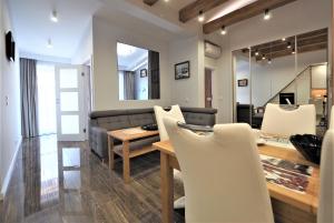 Posedenie v ubytovaní VIP Apartamenty Modrzejewska Residence