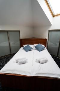 Łóżko lub łóżka w pokoju w obiekcie Hotel SANVIT RESTAURACJA & SPA