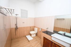 A bathroom at Wathsala Inn