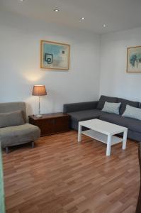 Posedenie v ubytovaní Claris Apartments