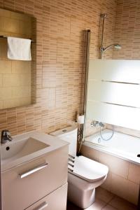 Kúpeľňa v ubytovaní Claris Apartments